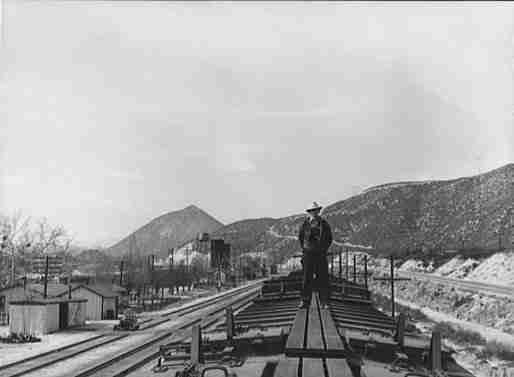 Brakeman atop a train 1943