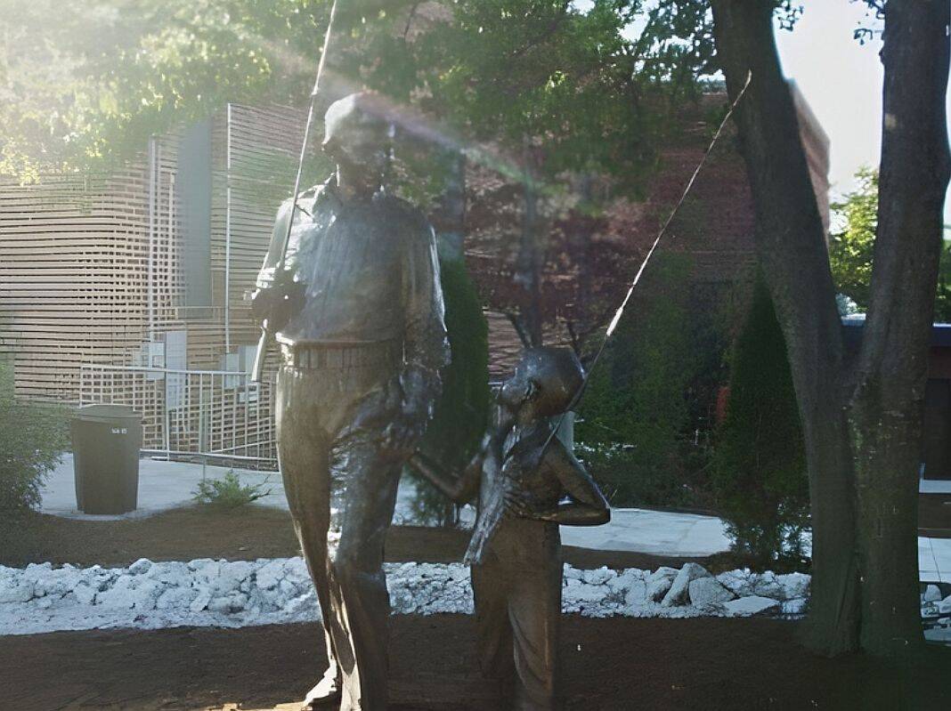 Bronze statue of Andy and Opie from The Andy Griffith Show in Mount Airy NC.