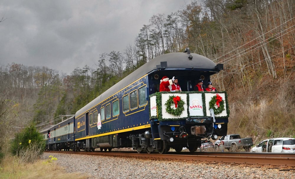 Santa waves from the rear car of the Appalachian Santa Train
