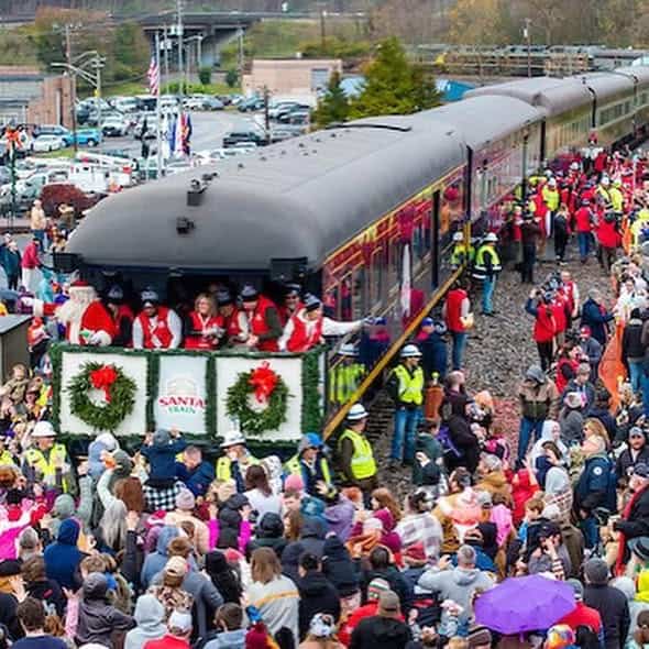 Families crowd beside the Appalachian Santa Train in Kingsport