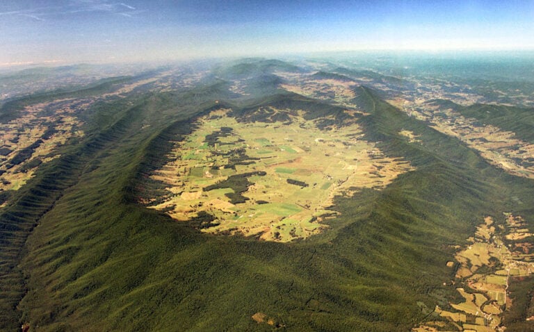 Aerial view of burkes garden virginia showing the enclosed valley surrounded by mountain ridges