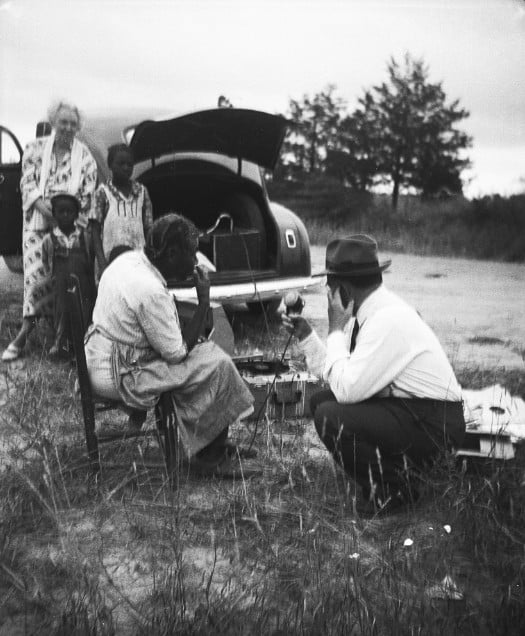 Alan Lomax recording Appalachian musicians during fieldwork in the 1930s.