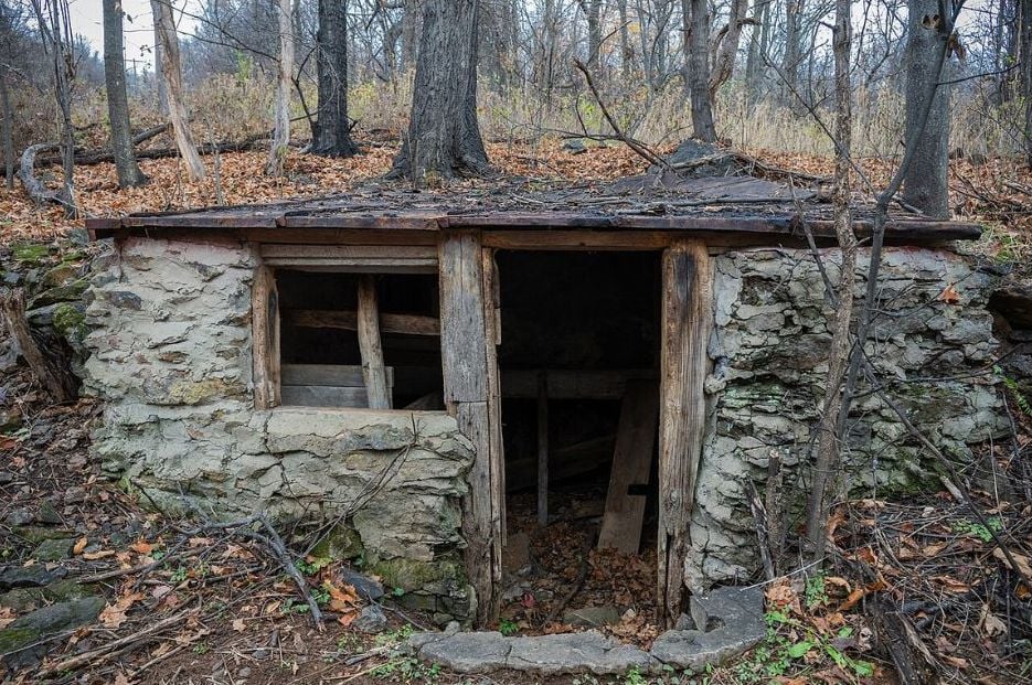 Stone entrance to one of the traditional Appalachian root cellars built into a hillside