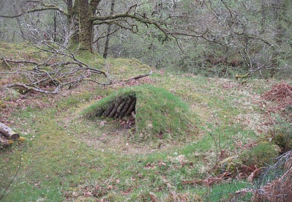 Historic charcoal burning platform similar to charcoal hearths in Appalachia built into a forest slope