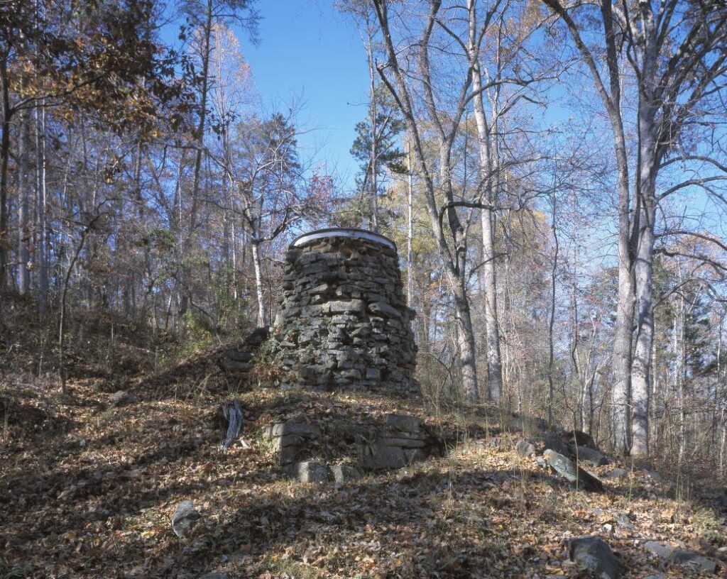 Charcoal hearths in Appalachia once supplied fuel to iron furnaces like this surviving stone stack