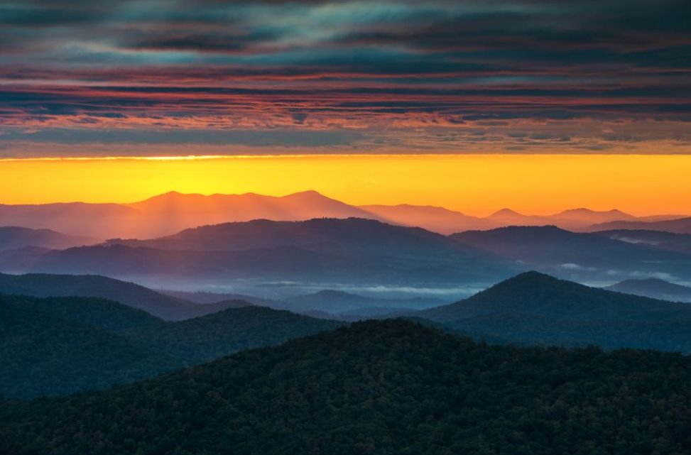 Distant Blue Ridge ridges fading into silhouette at sunset