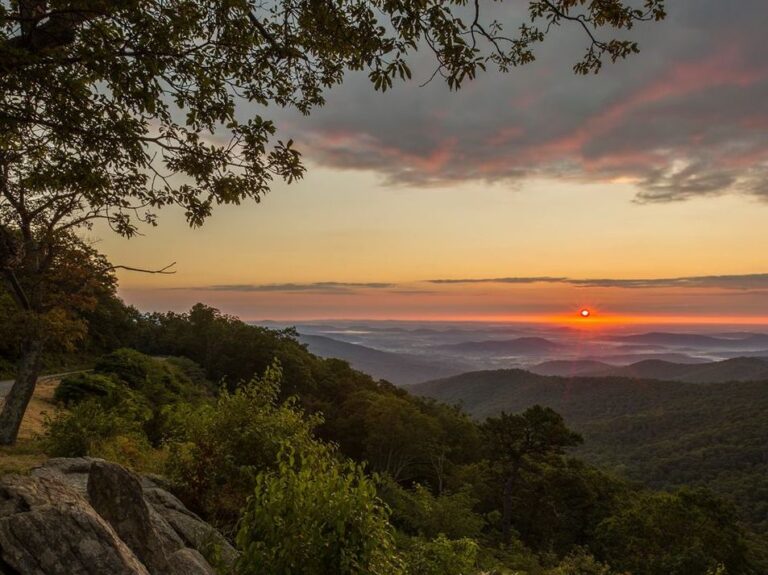 Blue Ridge night sky fading above layered mountain ridges at dawn