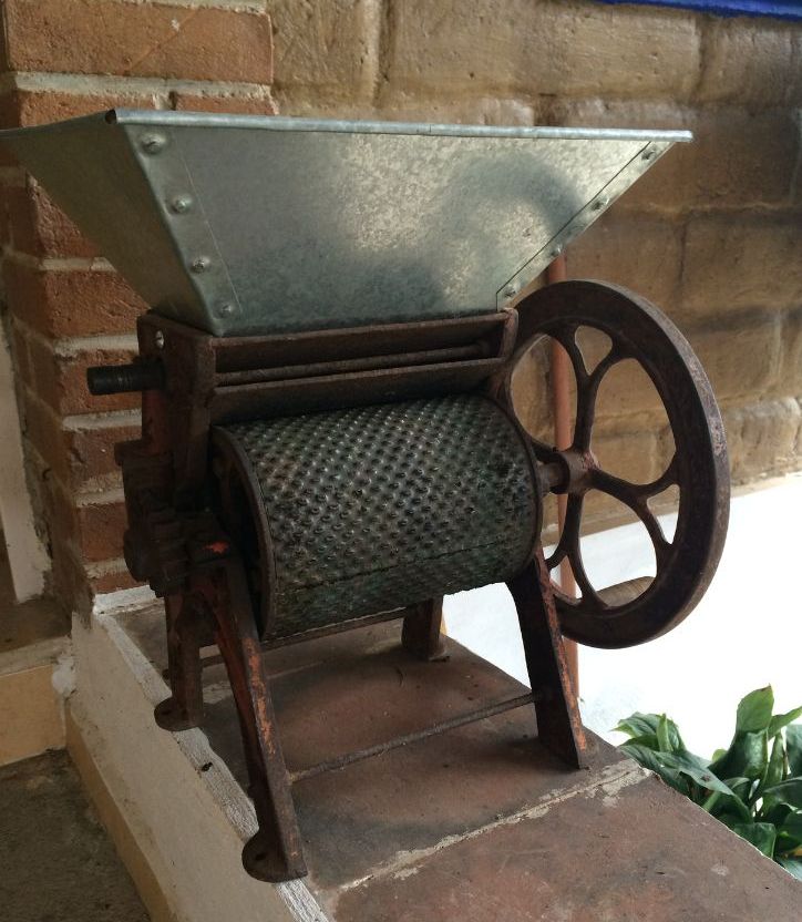Cast-iron burr mill used to grind corn and grain by hand