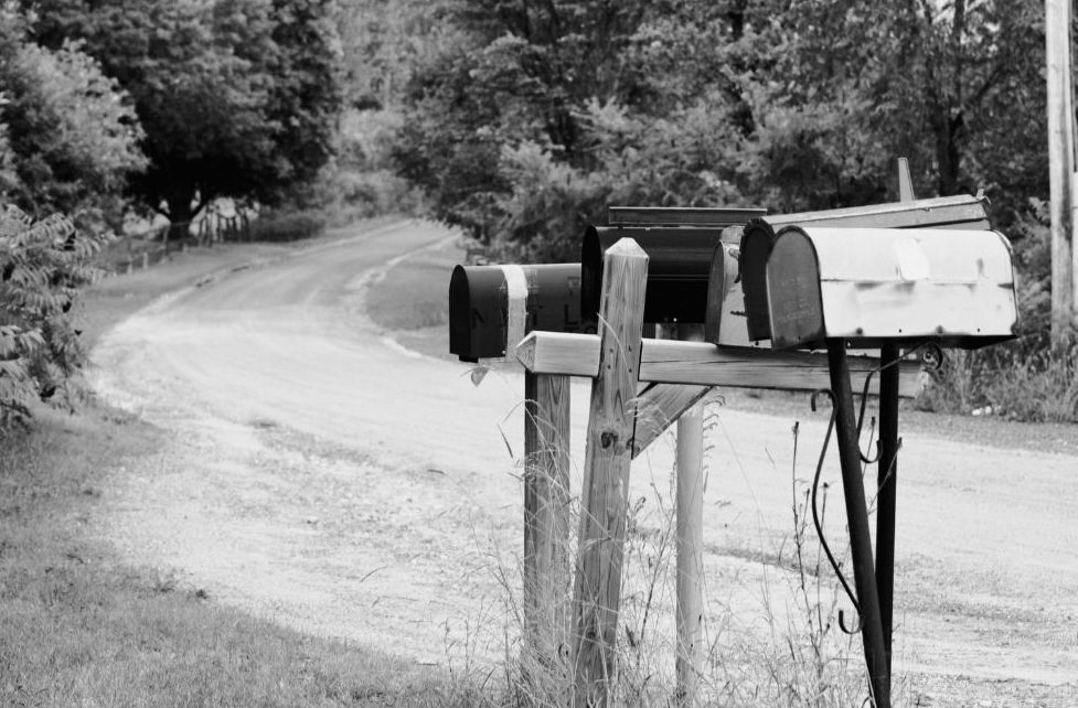 Rural Mail Delivery mailbox along a quiet country road