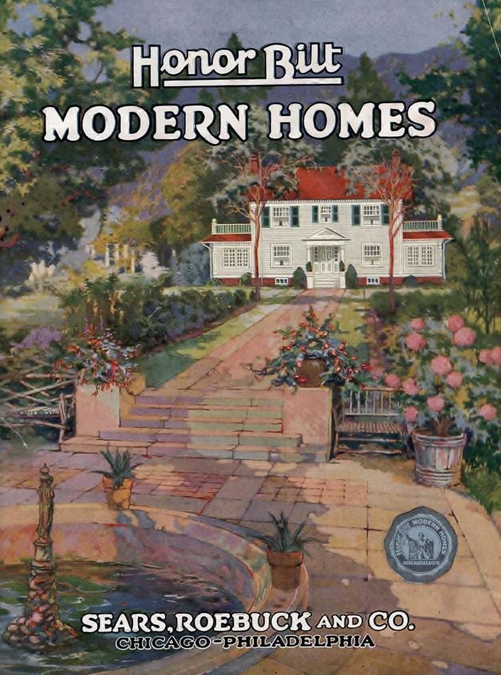 Vintage catalog cover featuring a white two-story house in a lush garden, with the title 'Honor Bilt Modern Homes' and 'Sears, Roebuck and Co.'