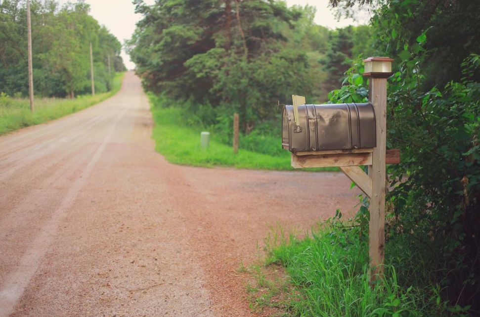 Rural Mail Delivery mailbox beside a country road in a rural community