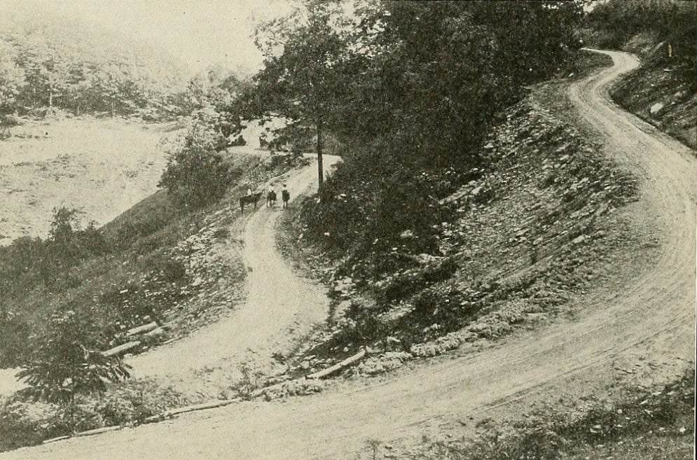 Mountain road illustrating the challenges of Rural Mail Delivery routes