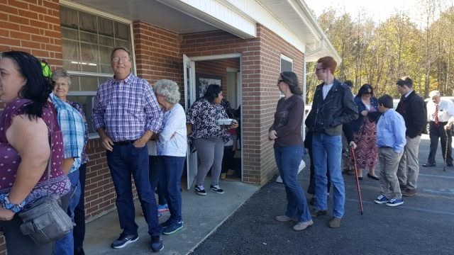 A long line forms outside Pancake Days, showing the scale of an Appalachian fundraising meal.
