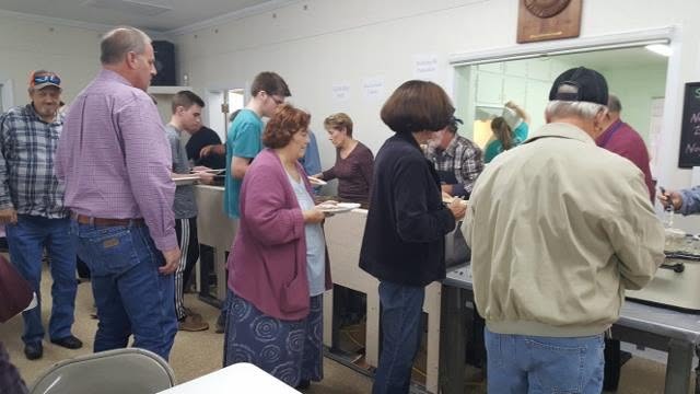 Volunteers serve diners during an Appalachian fundraising meal at Pancake Days.